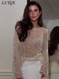 Fashionkova Fashion Women's Sequins Knit Hollow Out Pullovers Loose O-neck Long Sleeve Female Sweaters 2025 Spring Lady Shinny Chic Shirts Outfit Ideas