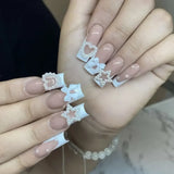 Fashionkova 24Pcs Long Coffin False Nails with Star Rhinestones Black Y2K Nail Art French Gradient Full Cover Press on Nail Tips for Girls
