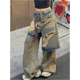 2024 Autumn Punk Sexy Vintage Ripped Harajuku Loose Jeans Y2K Hollow Out Trashy Pants Women's BaggyTassels Denim Trouser