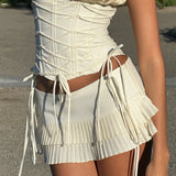 Fashionkova Women Pleated Mini Skirt 2025 Summer Going Out Lace Up Skirts Solid Color Layered Ruffle Short Skirts Streetwear Fairycore Outfit Idea