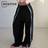 Fashionkova party look inspos Casual Striped Patchwork Women Pants Streetwear Elastic Waist Loose Trousers All-match Black Fashion Sweatpants Concise